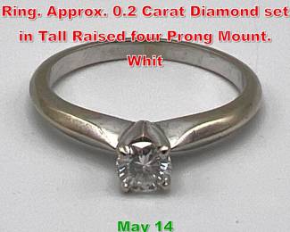 Lot 233 14K Gold Diamond Solitaire Ring. Approx. 0.2 Carat Diamond set in Tall Raised four Prong Mount. Whit