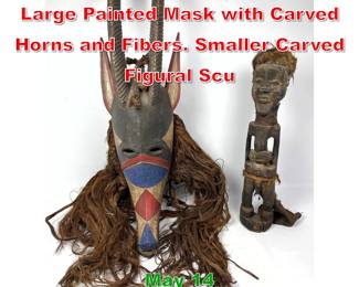 Lot 513 2pc Carved Wood African. Large Painted Mask with Carved Horns and Fibers. Smaller Carved Figural Scu