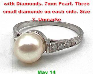 Lot 222 18K WG Gold Pearl Ring with Diamonds. 7mm Pearl. Three small diamonds on each side. Size 7. Unmarke