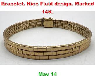 Lot 133 14K Gold Flat Link Bracelet. Nice Fluid design. Marked 14K. 