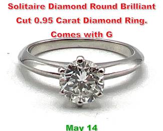 Lot 94 TIFFANY and Co. Platinum Solitaire Diamond Round Brilliant Cut 0.95 Carat Diamond Ring. Comes with G