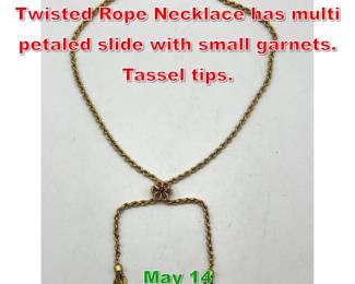 Lot 122 18K Gold Slide Chain. Twisted Rope Necklace has multi petaled slide with small garnets. Tassel tips.
