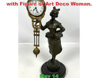Lot 309 Junhans Swinger Clock with Figure of Art Deco Woman. 