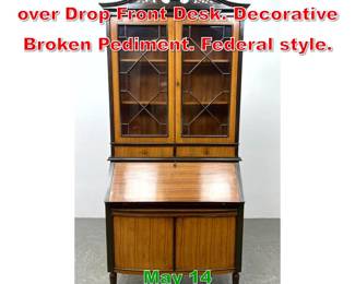 Lot 499 Two Part China Bookcase over Drop Front Desk. Decorative Broken Pediment. Federal style.