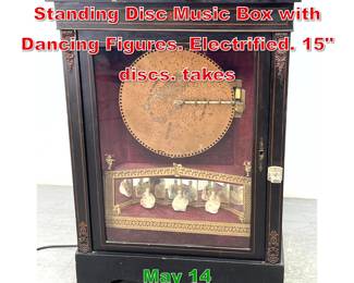 Lot 428 Antique Coin Of Upright Standing Disc Music Box with Dancing Figures. Electrified. 15 discs. takes 