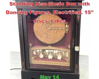 Lot 428 Antique Coin Of Upright Standing Disc Music Box with Dancing Figures. Electrified. 15 discs. takes 