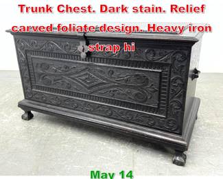 Lot 529 Antique Carved Oak Lidded Trunk Chest. Dark stain. Relief carved foliate design. Heavy iron strap hi