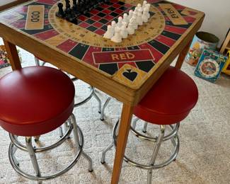 5 in 1 game board & red bar stools