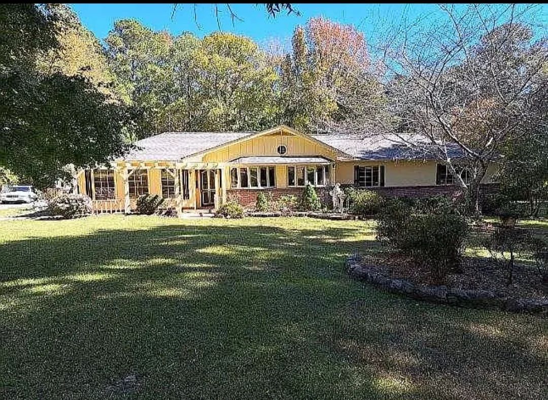 Home on 8 acres
2 huge Japanese Maples,  Fruit Trees Azaleas HOSTA & PERINALS
Gazebo, Ponds with lil bridges, The property is flat on a Quiet Dead End Street..
Quiet & a great place to have Horses & Raise some chickens...