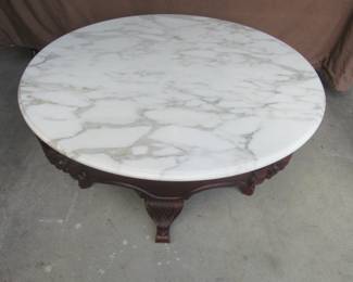 Solid wood classic Victorian style coffee table with Italian marble top. Carved rose details. Carlton McClendon design.
