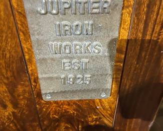 Plaque on Sideboard Featuring Rolling Doors