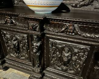 19th Century Italian Renaissance Revival Ebonized Sideboard with Monogrammed Cartouche Shield Crest - Approximately 76.25" High x 68.25" Wide x 22.75" Deep. 