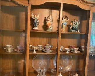 angel  collection - with lots of religious statuary  -           
 tea cup collection 