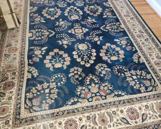 Blue area rug, measures: 11' x 7'8"