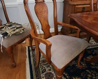 Table measures: 82" long (with one 13" leaf inserted) x 43" wide. Table w/ 2 13" leaves, 8 chairs (2 w/ arms) and pads. Dining table with chairs and china cabinet are AVAILABLE FOR PRE-SALE. Please contact us for pricing.