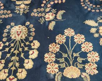 Blue area rug, measures: 11' x 7'8"