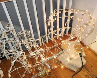 Lighted Christmas sleigh and reindeer. Both light. Deer has motor for movement, but I do not know how to connect for it to work.