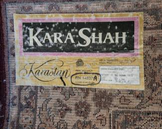 red area rug, 8'8" x 5'6"