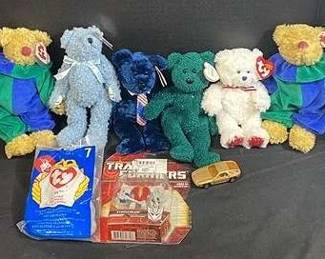 Beanie Babies, Transformer Figurine, And A Matchbox Car 