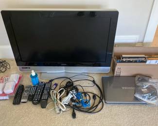 Mixed Electronic Lot Vizio Television, Toshiba Laptop, DVDs, Remotes  Cords 