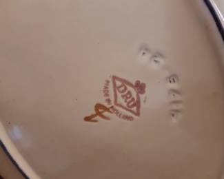 Makers mark on the bottom of the cast iron enamelware. 