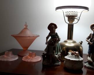Satin glass on the left, covered candy dish with matching candlesticks. 