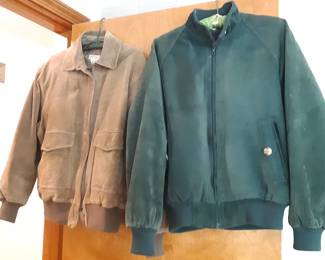 Both jackets are shades of green, and both jackets are suede.