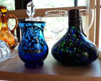 The blue green thing on the right is an oil lamp.