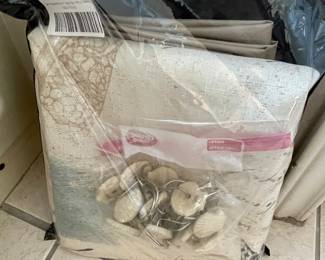 shower curtains and matching rings in coastal patterns