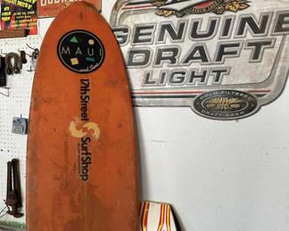 surfboards and beer signs