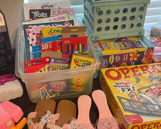 crayons, markers, dolls and games