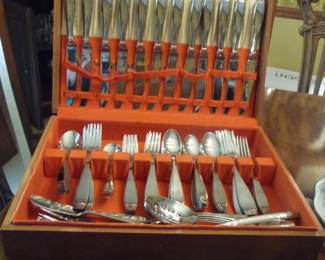 large set of flatware in the box