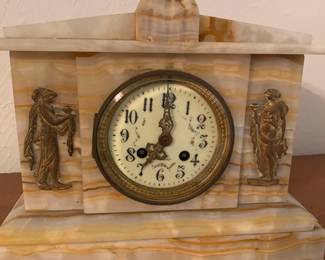 2nd of two white marble mantle clocks--this one features classical figures