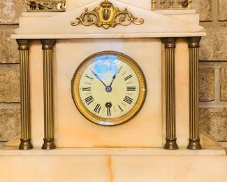 one of two white marble mantle clocks--This one has a dome