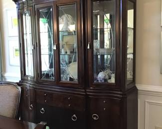 The Bassett China Hutch is available for IMMEDIATE PURCHASE. It is priced at 1,200 