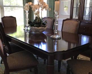 The Basset Dining Room Table comes with 2 extensions and 6 chairs. It is AVAILABLE FOR IMMEDIATE PURCHASE. Priced at 1,200