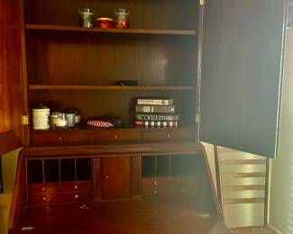 Interior of the beautifully wood secretary. 