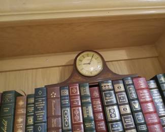 Vintage clock, leather bound President books