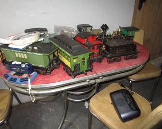 Vintage red chrome dinette with white chairs