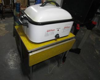 Small chrome formica table that folds out