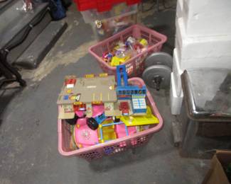 Bins of toys including Happy Meal from McDonalds
