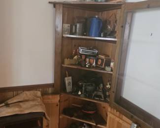 This corner cabinet was made by the owner. What's his name is herb. Same as my father. I hope this goes to 1 of the neighbors.  $75