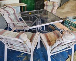 The five piece pink aluminum patio set with glass, top and cushions $150
