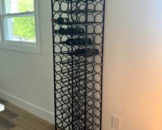 Vintage midcentury modern black wrought iron 67 bottle wine rack by Arthur Umanoff for Shaver Howard.