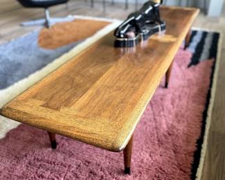 Midcentury modern 6 leg coffee table with dovetail inlay.