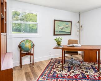 Midcentury modern desk by "Arne Vodder" with moveable side to side drawers and moveable top and drop leaf. Refinished and in amazing condition. 