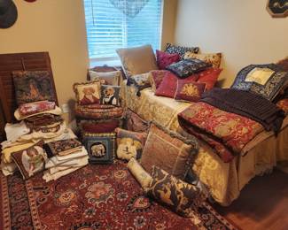 Pillow power! Twin sized bed, custom curtains and matching bedding sets. Several sets of shudders, more in garage.