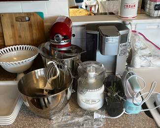 Various Small Kitchen Appliances 
-Kitchen Aid Stand Mixer with Various Accessories 
-Keurig 
-Food Processor 
-CBQ Hand Mixer 