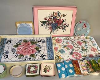 A Hostess Collection Of Floral Trays, Placemats, Needlepoint Casters, Porcelain Coasters And Paper Goods

