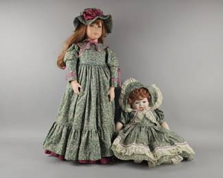 Lot 141 | Two Matching Porcelain Doll & Baby